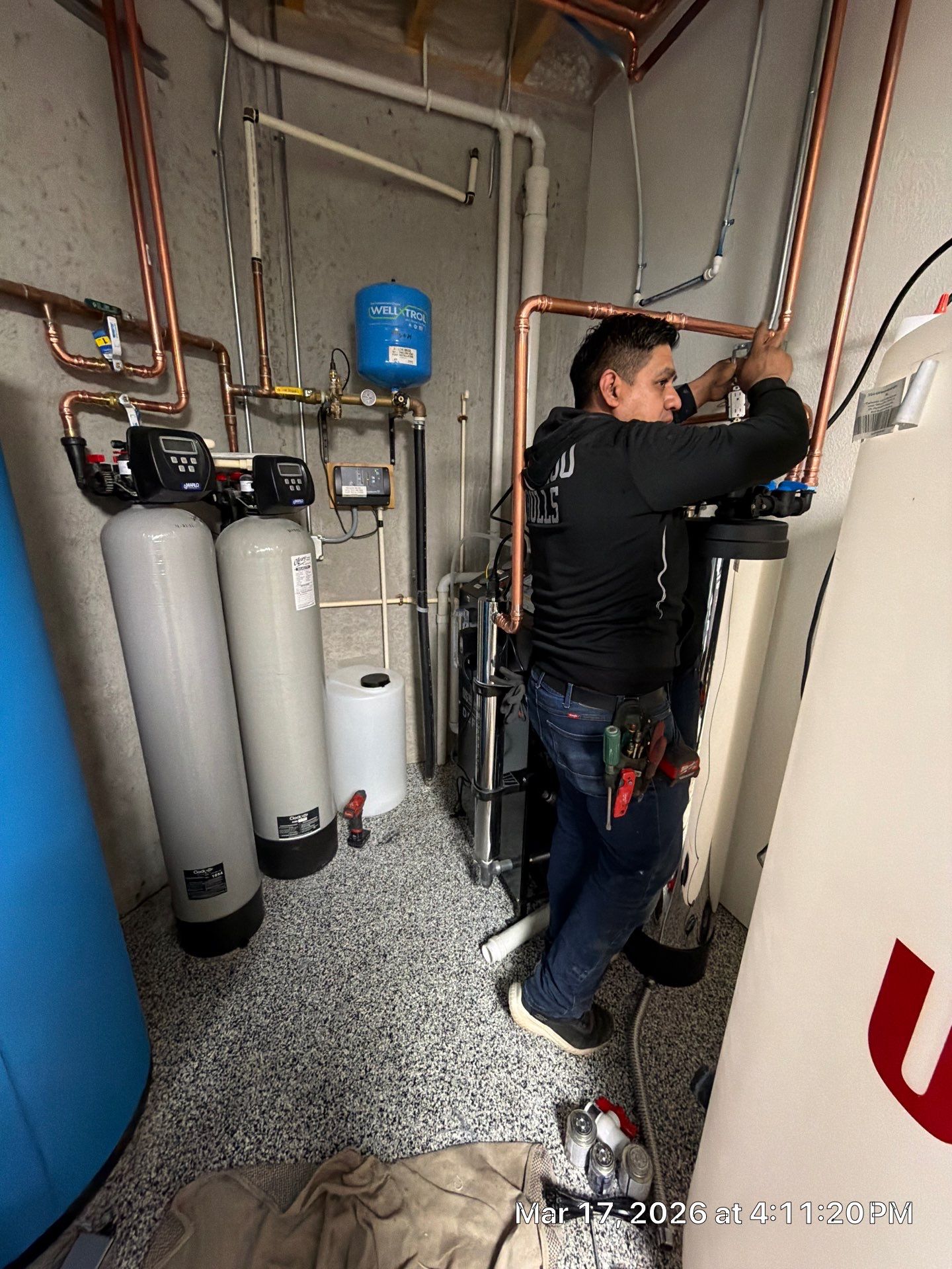 GSHA Services installing a whole-house water treatment system in Sussex Wisconsin