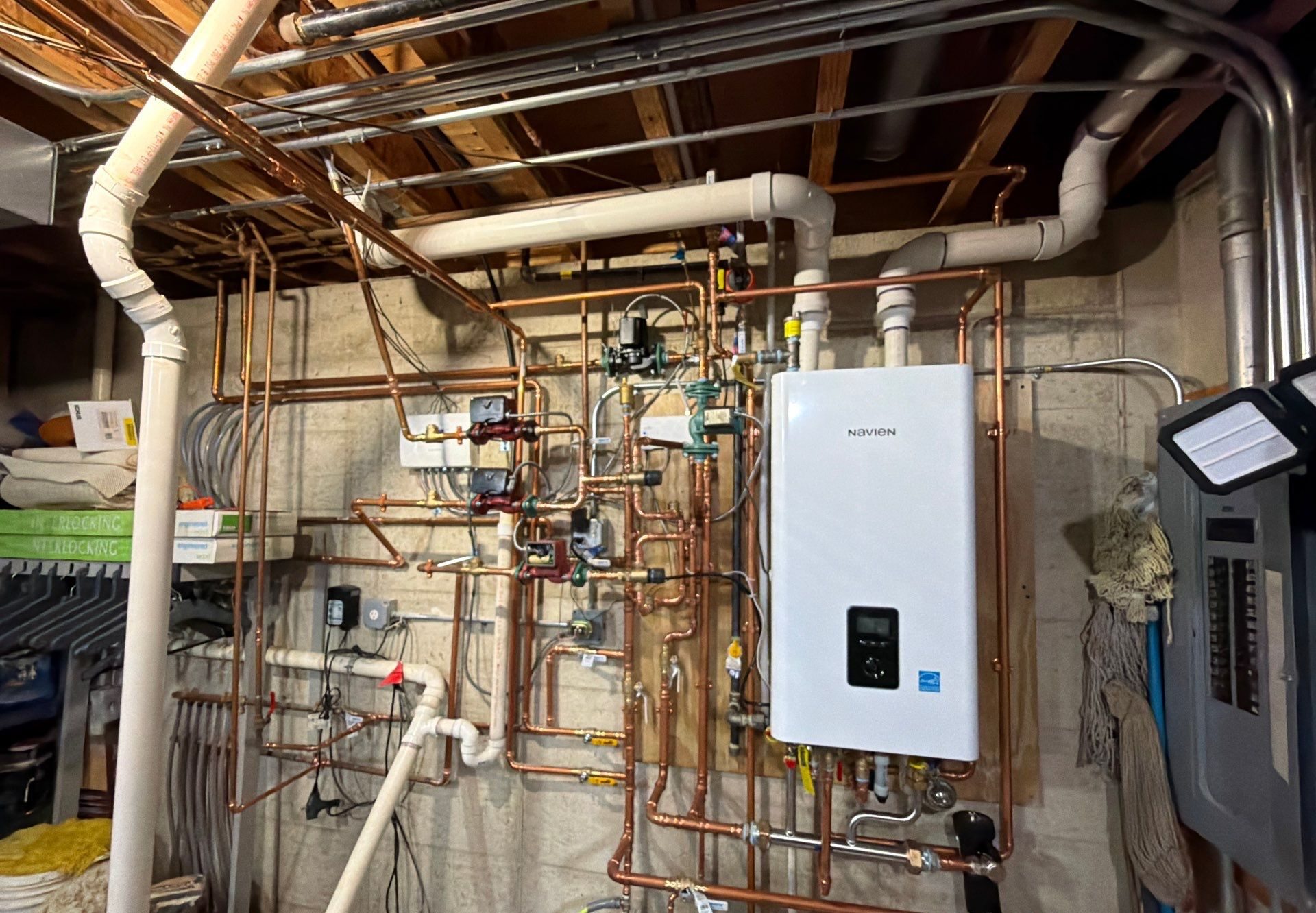 Navien wall-hung condensing boiler with multi-zone circulator pumps installed by GSHA Services in Woodstock, IL